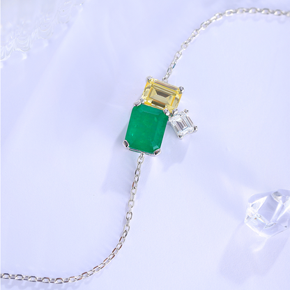 Pulseira personalizada ANSTER Jewelry com lapidação oval em ouro 18K e esmeralda cultivada em laboratório 