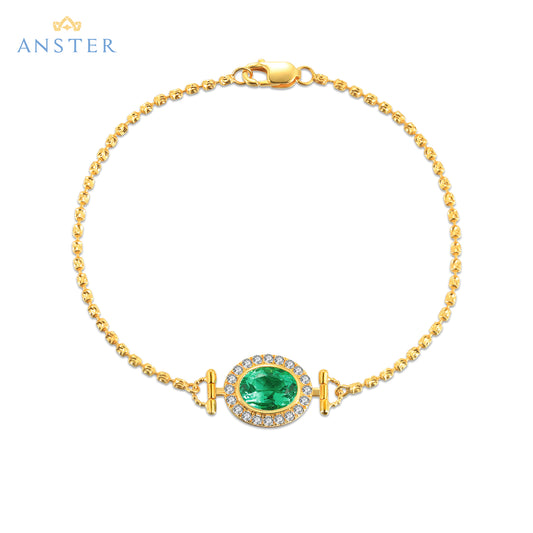 Pulseira personalizada ANSTER Jewelry com lapidação oval em ouro 18K e esmeralda cultivada em laboratório 